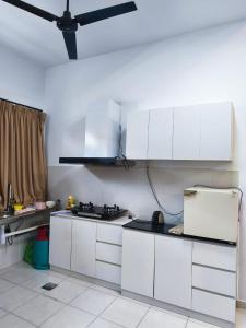 Photo de la galerie de l'établissement Ustazahhomestay, à Bemban