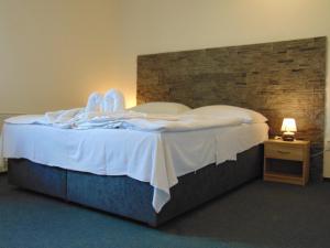 Postel nebo postele na pokoji v ubytování Hotel Isora