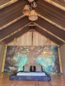 Ένα ή περισσότερα κρεβάτια σε δωμάτιο στο A Tea Hillside Bungalow