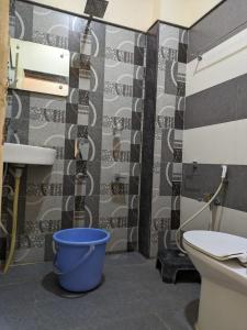 Ένα μπάνιο στο Hampi Two Bedroom Guesthouse