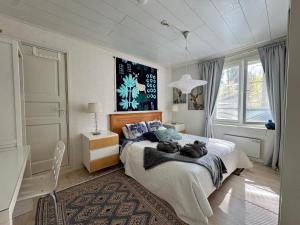 Ένα ή περισσότερα κρεβάτια σε δωμάτιο στο Villa Santala