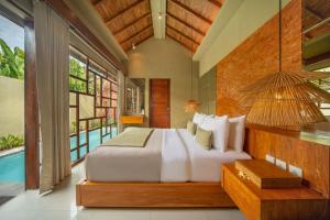 Bazén v ubytování Manca Villa Canggu by Ini Vie Hospitality nebo v jeho okolí