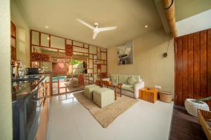 Postel nebo postele na pokoji v ubytování Manca Villa Canggu by Ini Vie Hospitality