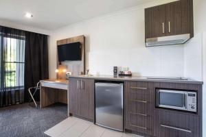 Cuina o zona de cuina de Doncaster Apartments by Nightcap Plus