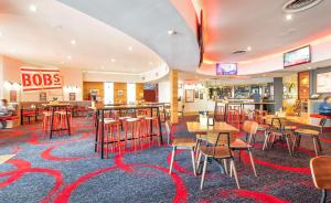 Restaurant o un lloc per menjar a Doncaster Apartments by Nightcap Plus