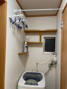 Koupelna v ubytování 西軽井沢小木屋