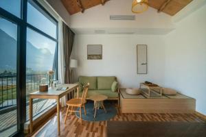Posezení v ubytování Gui zhou Wan Feng Lin Eave Boutique Hotel