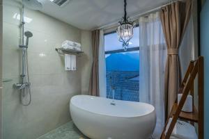 Koupelna v ubytování Gui zhou Wan Feng Lin Eave Boutique Hotel