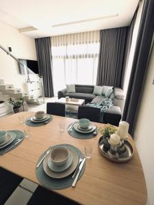 Φωτογραφία από το άλμπουμ του Lilly Lagoon Townhouse σε Ţāqah
