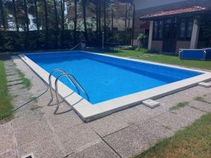 Bazén v ubytování B&B Origa Private Pool nebo v jeho okolí