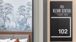 Certifikát, hodnocení, plakát nebo jiný dokument vystavený v ubytování Nizami Central Park Hotel