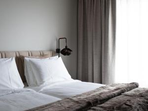 Letto o letti in una camera di Elite Hotel Frost - Hotel & Spa