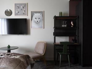 TV o dispositivi per l'intrattenimento presso Elite Hotel Frost - Hotel & Spa