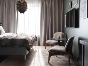 Letto o letti in una camera di Elite Hotel Frost - Hotel & Spa