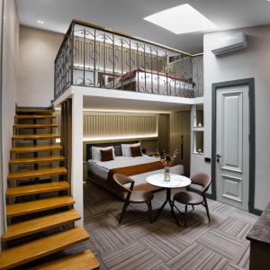 Postel nebo postele na pokoji v ubytování Nizami Central Park Hotel