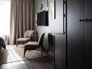 TV o dispositivi per l'intrattenimento presso Elite Hotel Frost - Hotel & Spa
