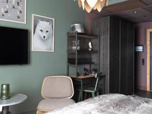 TV o dispositivi per l'intrattenimento presso Elite Hotel Frost - Hotel & Spa