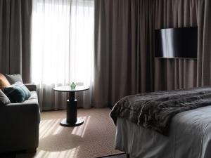 Letto o letti in una camera di Elite Hotel Frost - Hotel & Spa