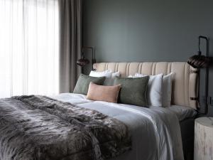 Letto o letti in una camera di Elite Hotel Frost - Hotel & Spa