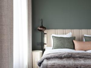 Letto o letti in una camera di Elite Hotel Frost - Hotel & Spa