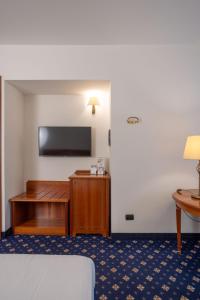 TV a/nebo společenská místnost v ubytování Hotel Ovest