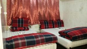 Postel nebo postele na pokoji v ubytování Toronto Motel Hk + 15 fotografií