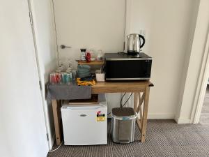 Η κουζίνα ή μικρή κουζίνα στο Cbay 1 Bedroom Suite
