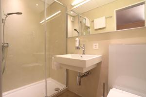 Koupelna v ubytování Hotel Elvezia Ascona