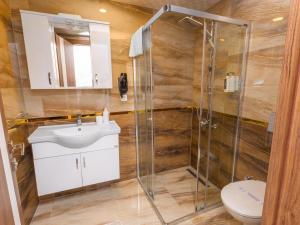 Koupelna v ubytování Quinnova Hotel