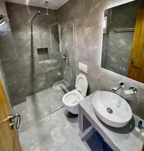 Koupelna v ubytování Karos Hotel Llaman