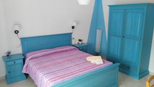 Postel nebo postele na pokoji v ubytování B&b Sa Zodia Guest House