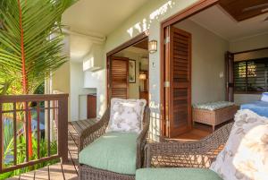 Gambar di galeri bagi Far Pavilion - A tranquil Hampton-style Villa di Port Douglas