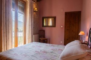 Postel nebo postele na pokoji v ubytování Apartamentos rurales La Alquería del Pilar