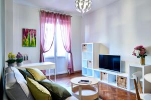 TV a/nebo společenská místnost v ubytování VEGA RIBBON