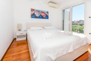 Postel nebo postele na pokoji v ubytování Apartment Belle Vue