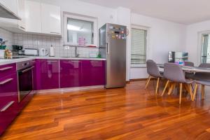 Kuchyň nebo kuchyňský kout v ubytování Apartment Belle Vue