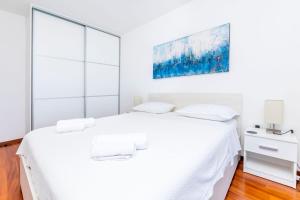 Postel nebo postele na pokoji v ubytování Apartment Belle Vue