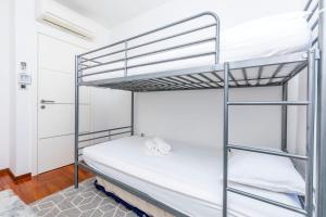 Postel nebo postele na pokoji v ubytování Apartment Belle Vue