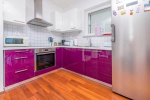 Kuchyň nebo kuchyňský kout v ubytování Apartment Belle Vue