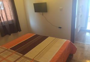 Posteľ alebo postele v izbe v ubytovaní Apartments Neno