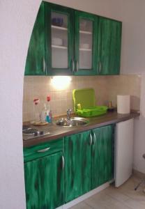 Kuchyňa alebo kuchynka v ubytovaní Apartments Neno