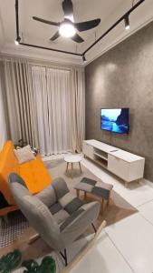 Μια τηλεόραση ή/και κέντρο ψυχαγωγίας στο Platino Apartment by Comfort Places Management