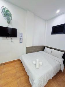 TV a/nebo společenská místnost v ubytování GoldenOne Đà Lạt