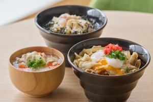 three bowls of food sitting on a table at Kobe Motomachi Tokyu REI Hotel in Kobe