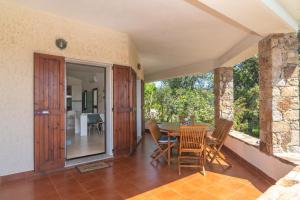 Balkón nebo terasa v ubytování Villa Vista Mare Cala Ginepro