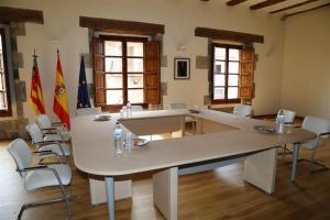 a large conference room with a large table and chairs at Hotel Rural Los Abriles in El Toro +131 photos