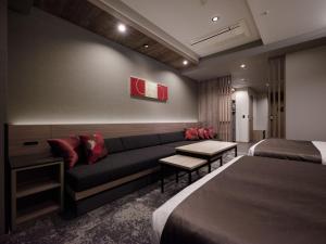 Postel nebo postele na pokoji v ubytování GRAND MONday GINZA