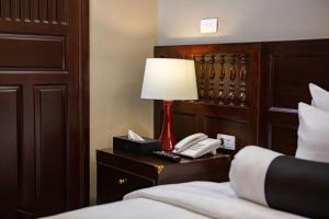 Voodi või voodid majutusasutuse Lotusama Central Hanoi Hotel toas