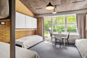 Postel nebo postele na pokoji v ubytování Flinten Horsens