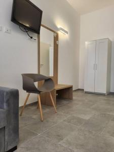 TV a/nebo společenská místnost v ubytování Borgo di Levante luxury apartments